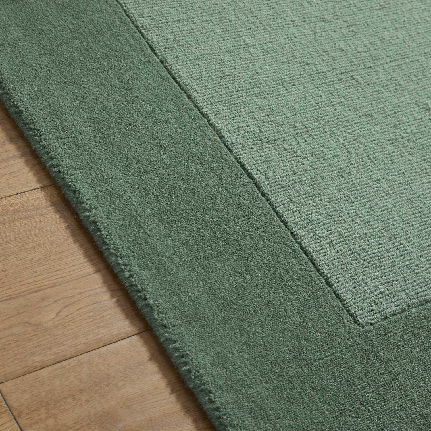 Colours Bordered Wool Rug - Green