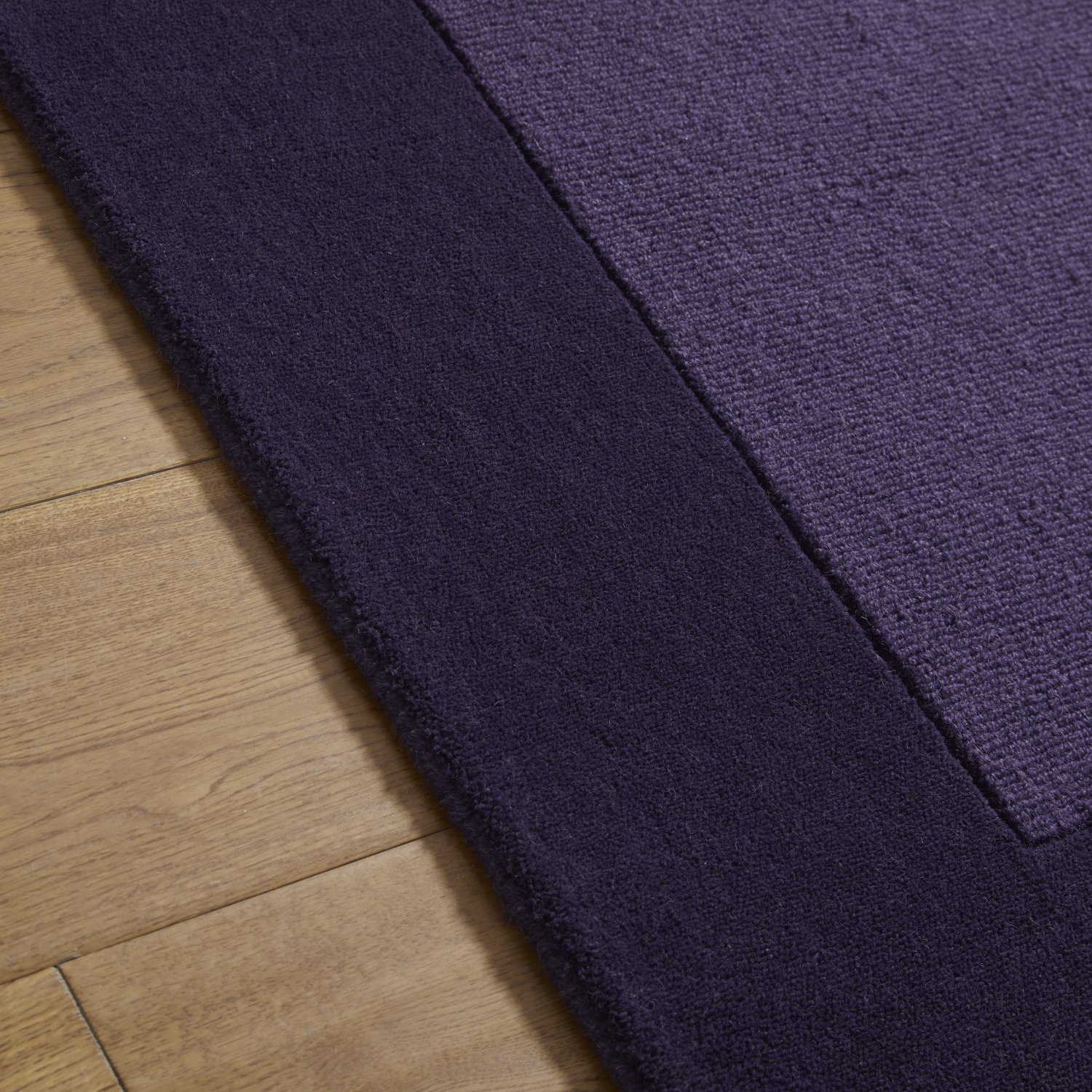 Colours Bordered Wool Rug - Purple